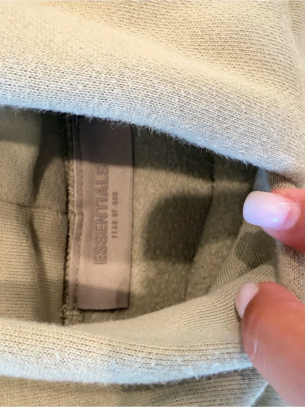 Large Fear of God ESSENTIALS Hoodie in Light Green